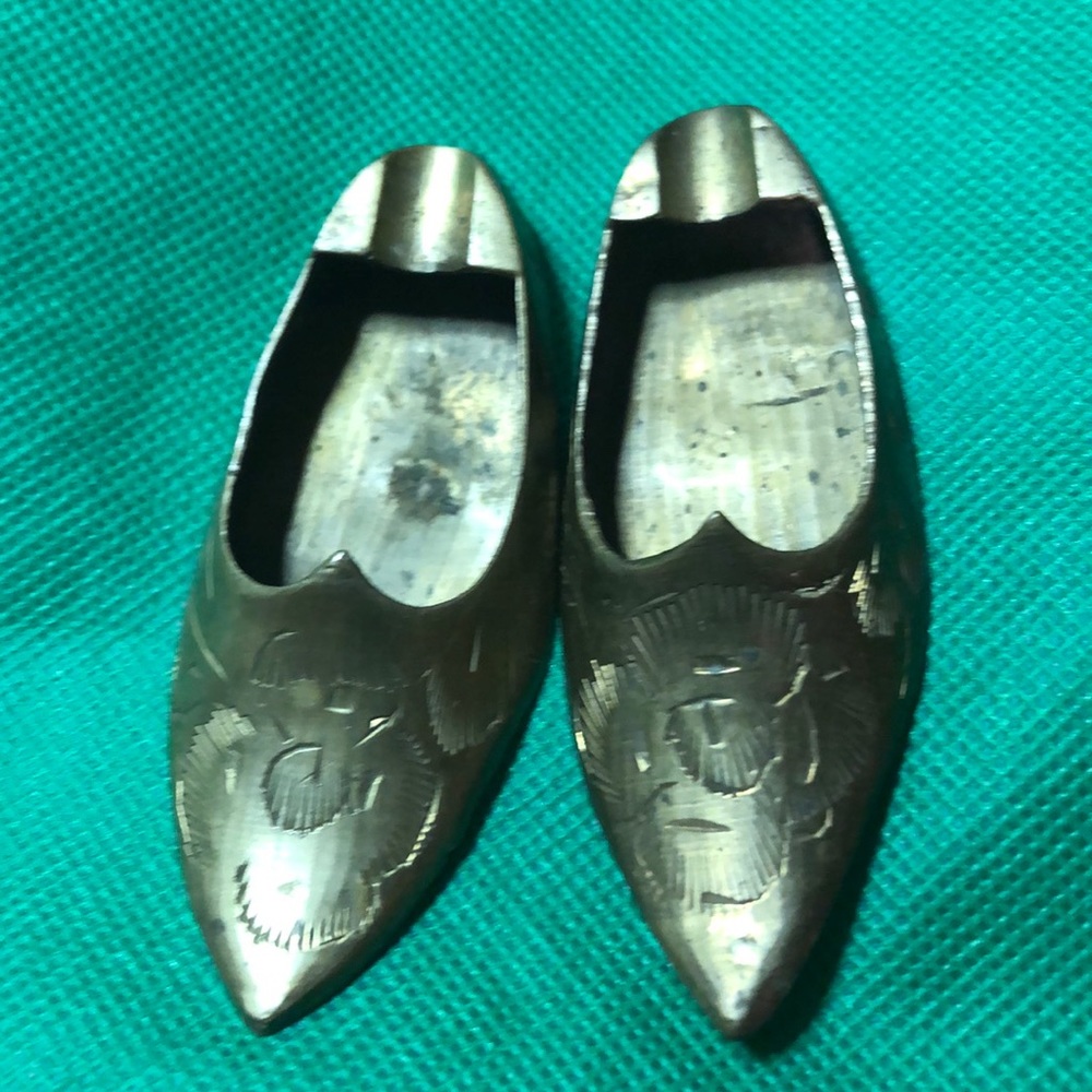 Village and collectible pair of bronze ashtray